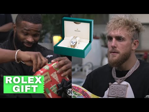 Jake Paul gives Tyron Woodley a Rolex Watch